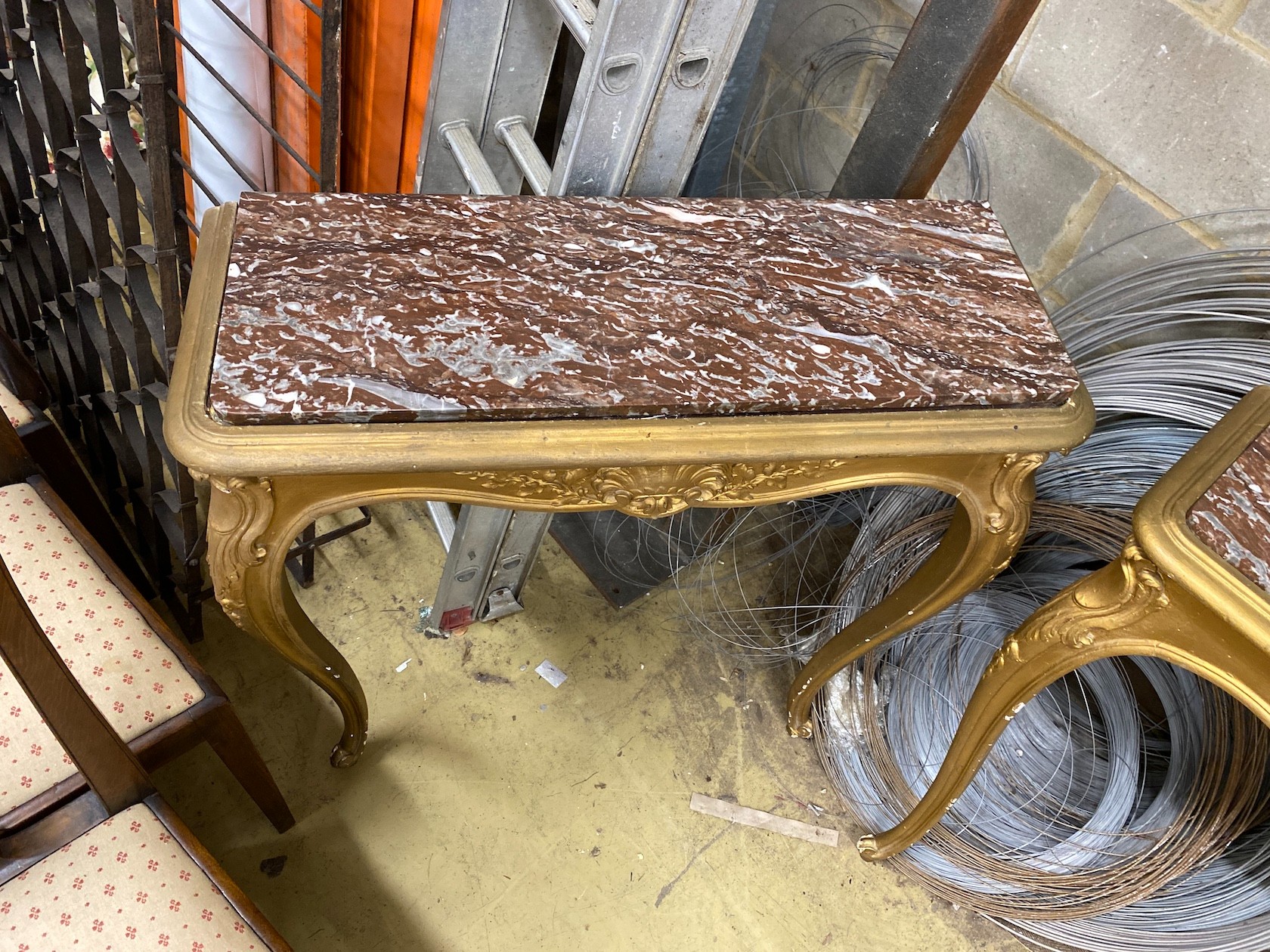 A pair of late 19th century French carved giltwood marble top console tables, width 80cm, depth 29cm, height 87cm